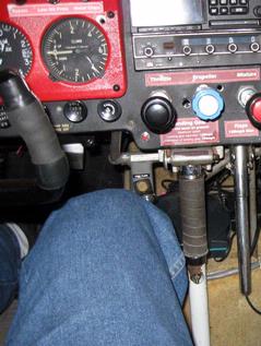 The WxWorx XM Weather receiver is visible to the right of my leg, velcroed to the top of the carpeted gear well WXWorxReceiver.jpg
